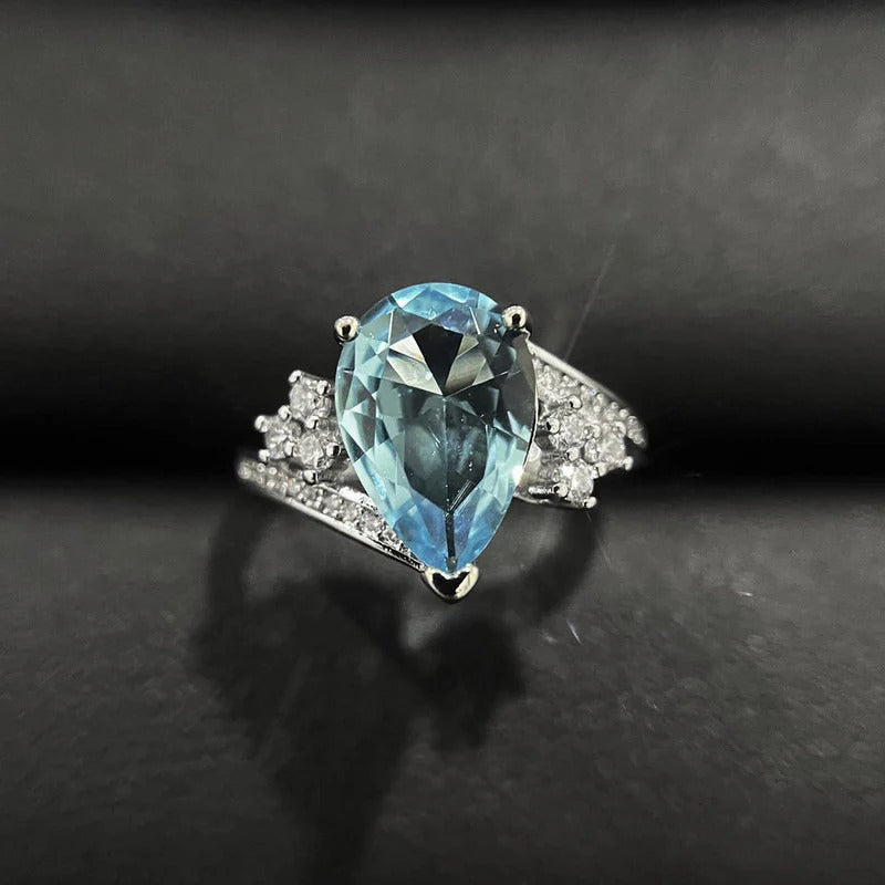 DRIARA 0152  Silver Plated Blue Crushed Ice Cut Teardrop Stone Ring | Premium American Diamond Finger Ring for Women