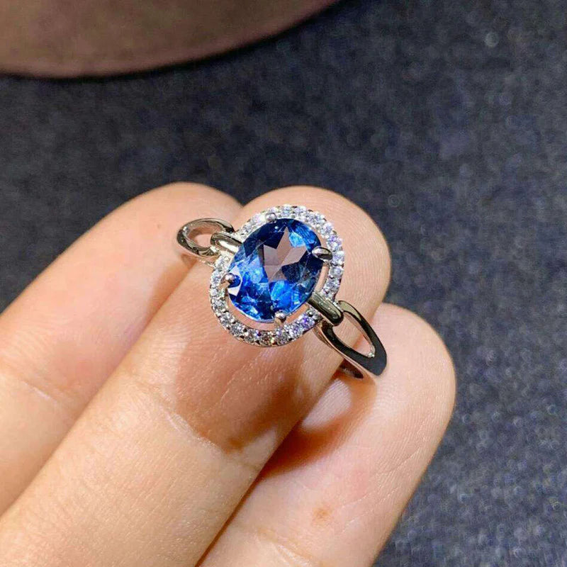 DRIARA 0155 Silver Plated Blue Oval Halo Crushed Ice Cut Ring | Premium American Diamond Finger Ring for Women