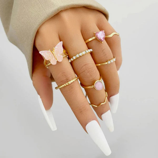 Driara 0138  Gold Plated Butterfly & Pink Stone Stackable Rings | Set of 8 Adjustable Trendy Rings for Women & Girls