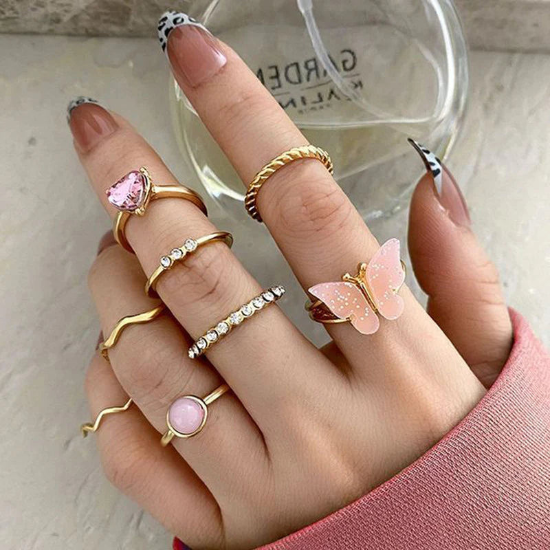 Driara 0138  Gold Plated Butterfly & Pink Stone Stackable Rings | Set of 8 Adjustable Trendy Rings for Women & Girls